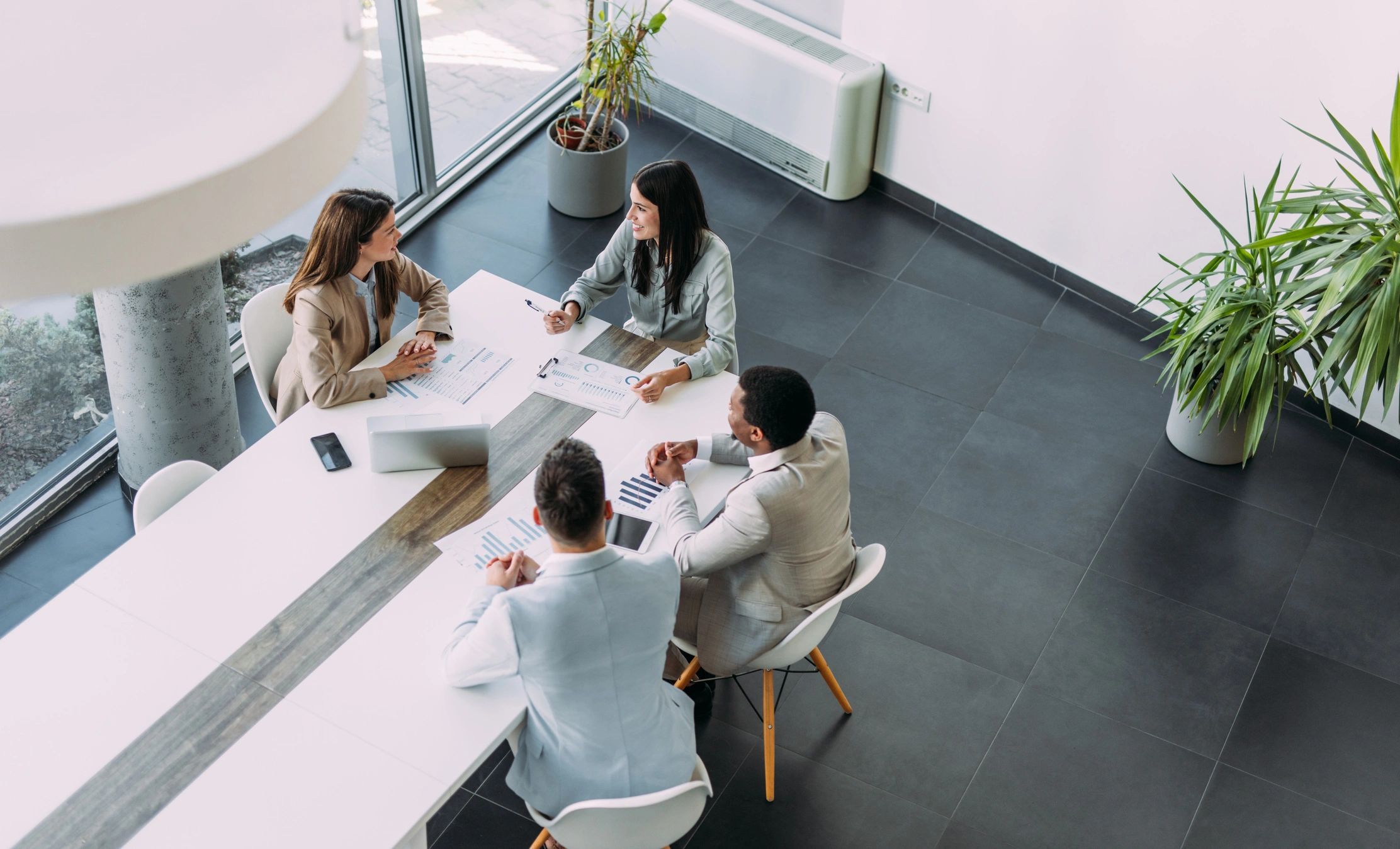 Industry stakeholders gathered around a boardroom table