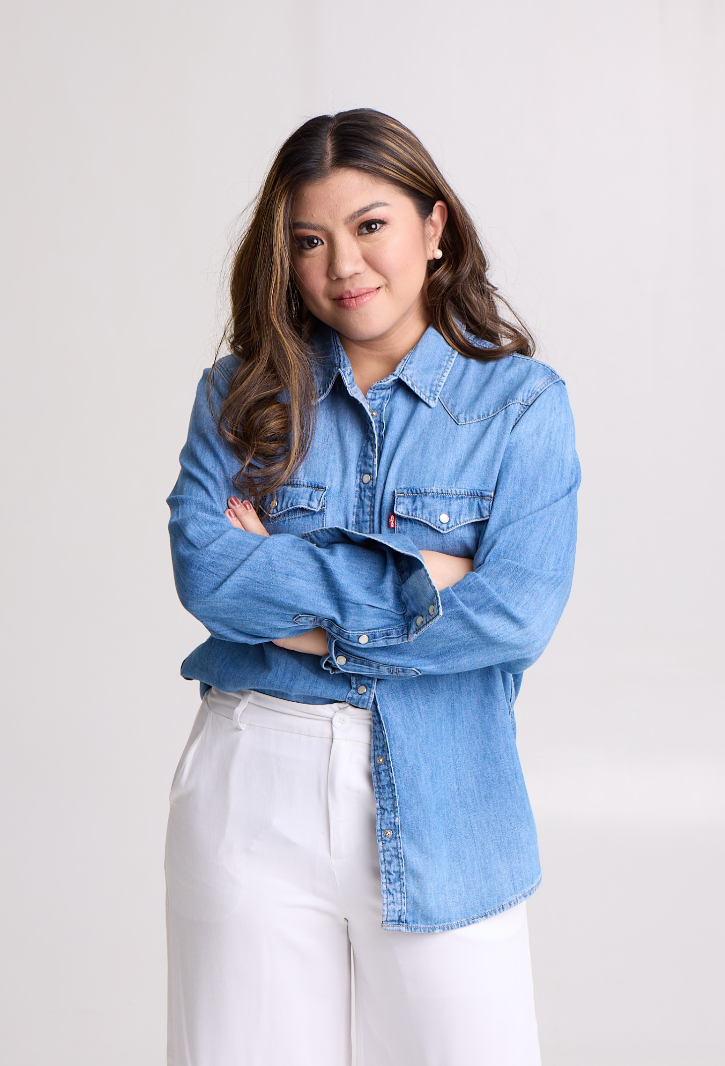 Portrait of Jel Directo standing with arms crossed